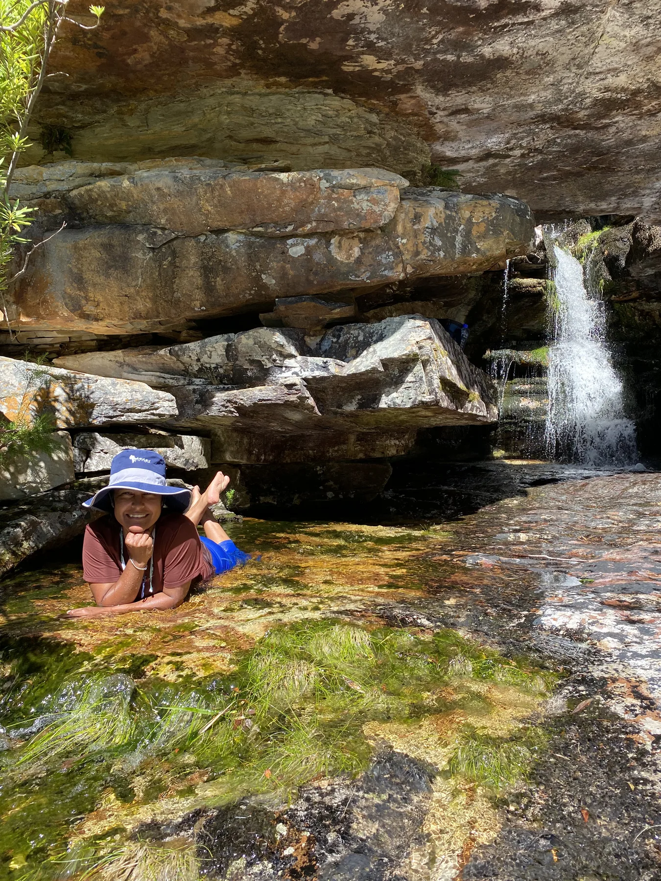 Swimming at a natural waterfall pool in Bainskloof