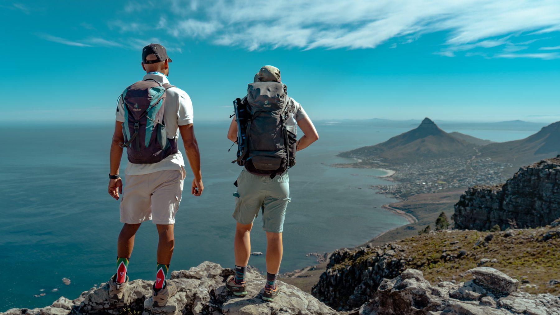 Hikers looking across the Atlantic coastline from Table Mountain
