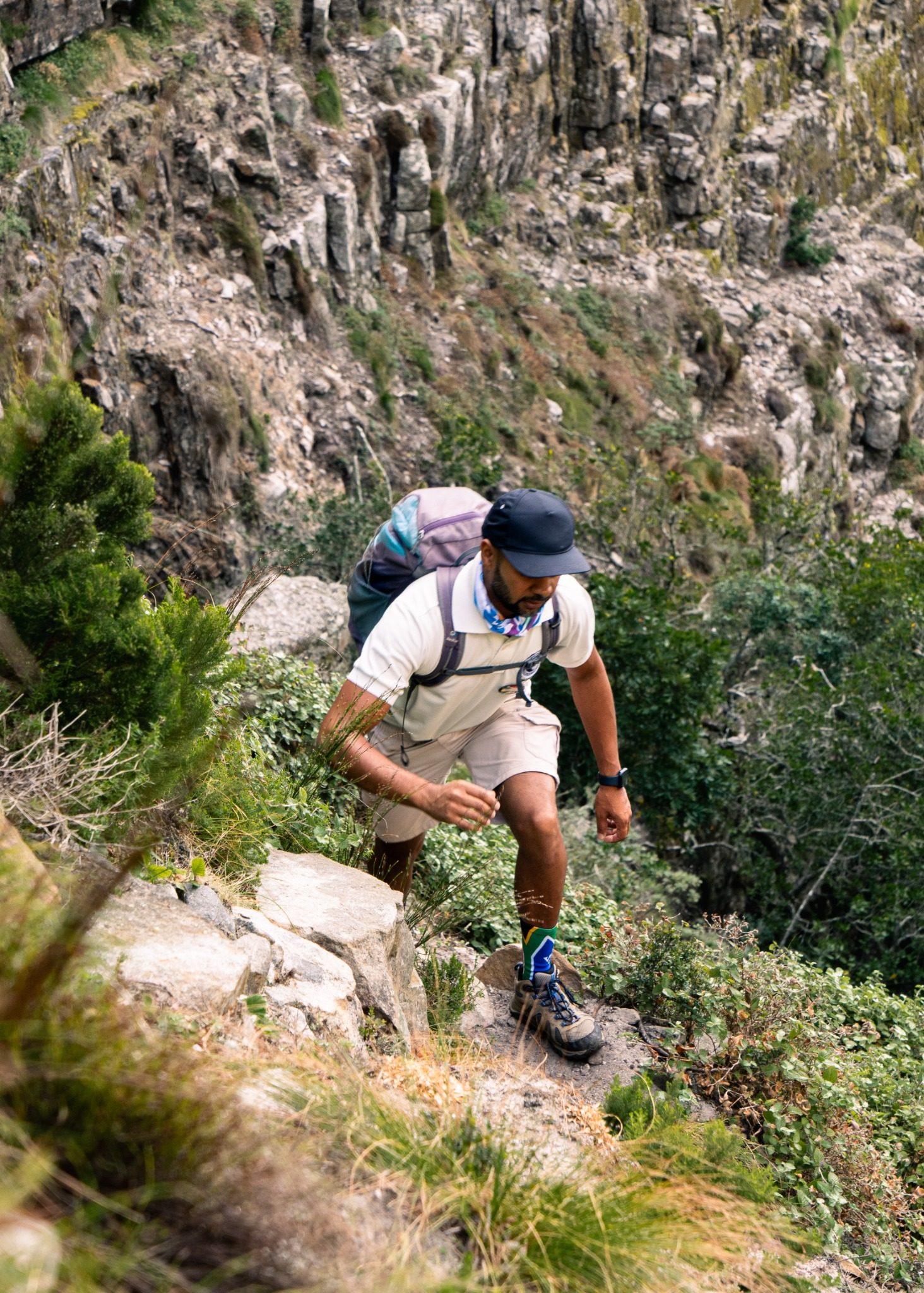 Outdoor Addicts guide climbing rocky terrain on Table Mountain